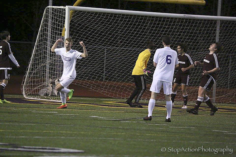Photo courtesy of Don Borin/Stop Action Photography                                Issaquah senior forward Jack MacDonald celebrates after scoring a goal in the 39th minute of play against the Mercer Island Islanders. Issaquah defeated Mercer Island 2-1 on March 15 in a non-league matchup.