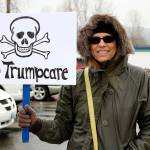 Protesters urge Reichert to oppose ‘Trumpcare’ at Issaquah rally