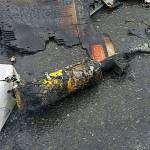 Recycling truck dumps haul of materials after fire breaks out in rear of vehicle