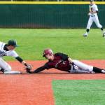 Photo courtesy of Rick Edelman/Rick Edelman Photography                                Eastlake sophomore infielder Dalton Chandler, right, gets thrown out at second base while attempting to steal a base. Eastlake registered a 5-4 victory against Skyline on April 13.