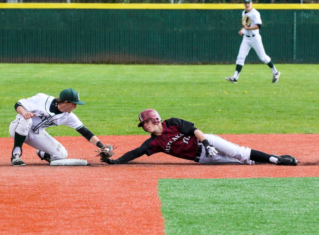 Photo courtesy of Rick Edelman/Rick Edelman Photography                                Eastlake sophomore infielder Dalton Chandler, right, gets thrown out at second base while attempting to steal a base. Eastlake registered a 5-4 victory against Skyline on April 13.