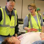Even when confronted with realistic and sometimes grotesque-looking injuries, CERT students had to keep a cool head and figure out how best to help the victims. Nicole Jennings/staff photo