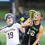 Photo courtesy of Rick Edelman/Rick Edelman Photography                                The Issaquah School District girls lacrosse team captured a 19-3 win against the Bellevue Wolverines on April 26 at Robinswood Park in Bellevue. Issaquah improved their overall record 9-1 with the win while Bellevue dropped to 3-5. Issaquah player Julia Hepperle, right, and Bellevue player Kimberly Nickerson, left, battle to gain possession of the ball.
