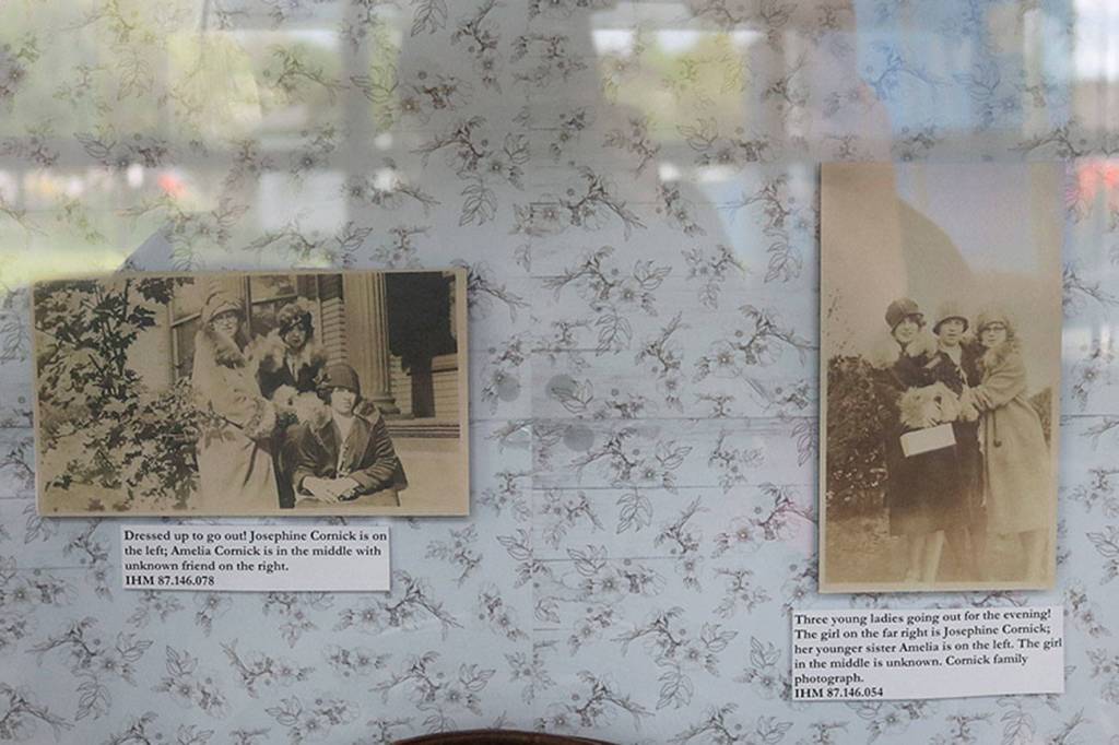 Preserved photos, such as these images of flapper Josephine Cornick and her family and friends, are included in the display. Nicole Jennings/staff photo