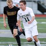 Photo courtesy of Rick Edelman/Rick Edelman Photography                                Skyline Spartans junior Joseph Camp, right, dribbles the ball down the field in the KingCo 4A soccer tournament championship game. The Skyline Spartans boys soccer team clinched a berth at the Class 4A state tournament with a 1-0 victory against the Issaquah Eagles on May 9 at Skyline High School in Sammamish.