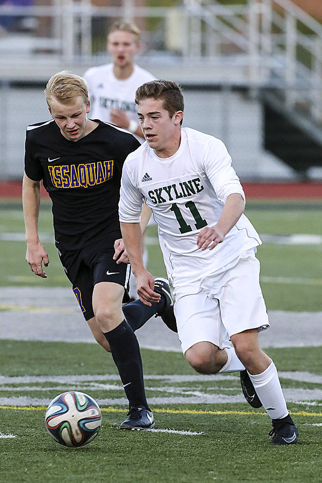 Photo courtesy of Rick Edelman/Rick Edelman Photography                                Skyline Spartans junior Joseph Camp, right, dribbles the ball down the field in the KingCo 4A soccer tournament championship game. The Skyline Spartans boys soccer team clinched a berth at the Class 4A state tournament with a 1-0 victory against the Issaquah Eagles on May 9 at Skyline High School in Sammamish.