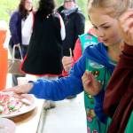 Girl Scouts were eager to try the kokanee-shaped cookies, complete with red frosting to match the color of the little fish. Nicole Jennings/staff photo