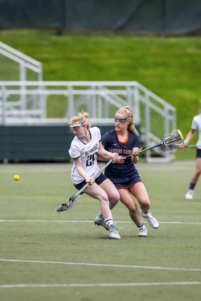 Photo courtesy of Rick Edelman/Rick Edelman Photography                                The Eastside Catholic Crusaders girls lacrosse team won its second consecutive state championship courtesy of a 16-11 win against the Bainbridge Island Spartans on May 19 at Starfire Sports Complex in Tukwila. The Crusaders outscored the Spartans 7-4 in the second half.