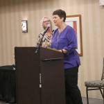 Issaquah Kiwanis Volunteer of the Year Award winner Debbie Berto gives a thank you to the Kiwanis after receiving her award. Nicole Jennings/staff photo