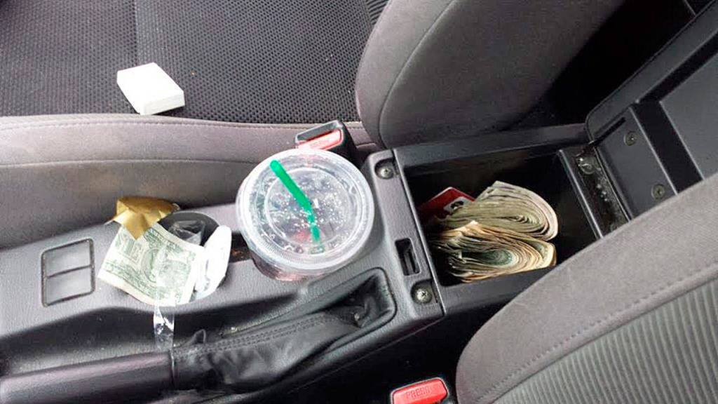 In addition to the drugs, detectives also uncovered $28,000 in cash. Photo courtesy of King County Sheriff&rsquo;s Office