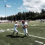 Shaun Scott/staff photo                                Eastlake Wolves wide receiver Soham Paul, right, makes a move up the field during Eastlake&rsquo;s fourth spring practice session on June 2 at Eastlake High School in Sammamish.