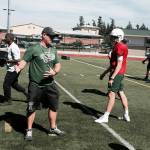 Shaun Scott/staff photo                                Skyline Spartans Mat Taylor instructs a player on the fundamentals of the game during the fourth spring football practice on June 6. Taylor was presented with the Gatorade Coaching Excellence Award on June 5 at Skyline High School. The award, which is given out to just two coaches throughout the U.S. per year, honors the best and most dedicated high school coaches across the country.