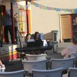Students from Issaquah&rsquo;s Puget Sounds Piano School entertained the audience outside of the Historic Shell Station. Nicole Jennings/staff photo