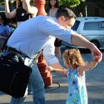 Fathers and daughters danced along to the rock music outside of City Hall. Make Music Day is not just a time for the musicians onstage to perform; audience members are encouraged to dance and clap along. Nicole Jennings/staff photo