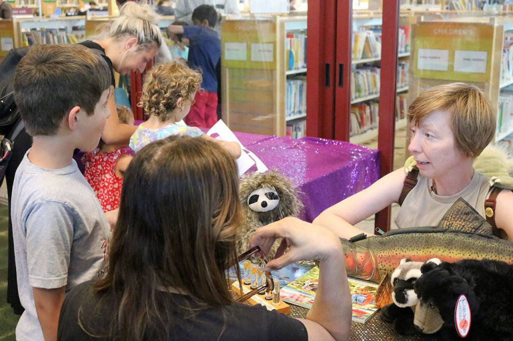 Dressed as Luke Skywalker, Pepper Hambrick of Friends of the Issaquah Salmon Hatchery gave kids a lesson in ecology. Nicole Jennings/staff photo