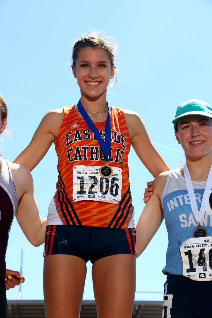 Photo courtesy of Karen Hatch                                Eastside Catholic Crusaders freshman track athlete Kate Jendrezak captured a Class 3A state title in the 800-meter dash,clocking a time of 2:10.99 on May 27 at Mount Tahoma High School in Tacoma. Holy Names Academy senior Erin Ripplefinished in second place with a time of 2:13.18.