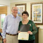 Jennifer Daily accepts her certificate from Mayor butler. (Evan Pappas/Staff Photo)