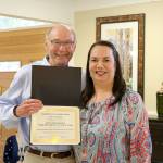 Fred Butler presents a certificate of appreciation to Lisa Stubenrauch. (Evan Pappas/Staff Photo)