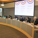 From left to right, Sammamish City Council candidates Minal Ghassemieh, Karen Howe, Karen Moran, Ryika Hooshangi, Rituja Indapure, Chris Ross, Melanie Curtright, John Robinson and Pam Stuart answer questions from the community Monday in City Hall. Megan Campbell/staff photo