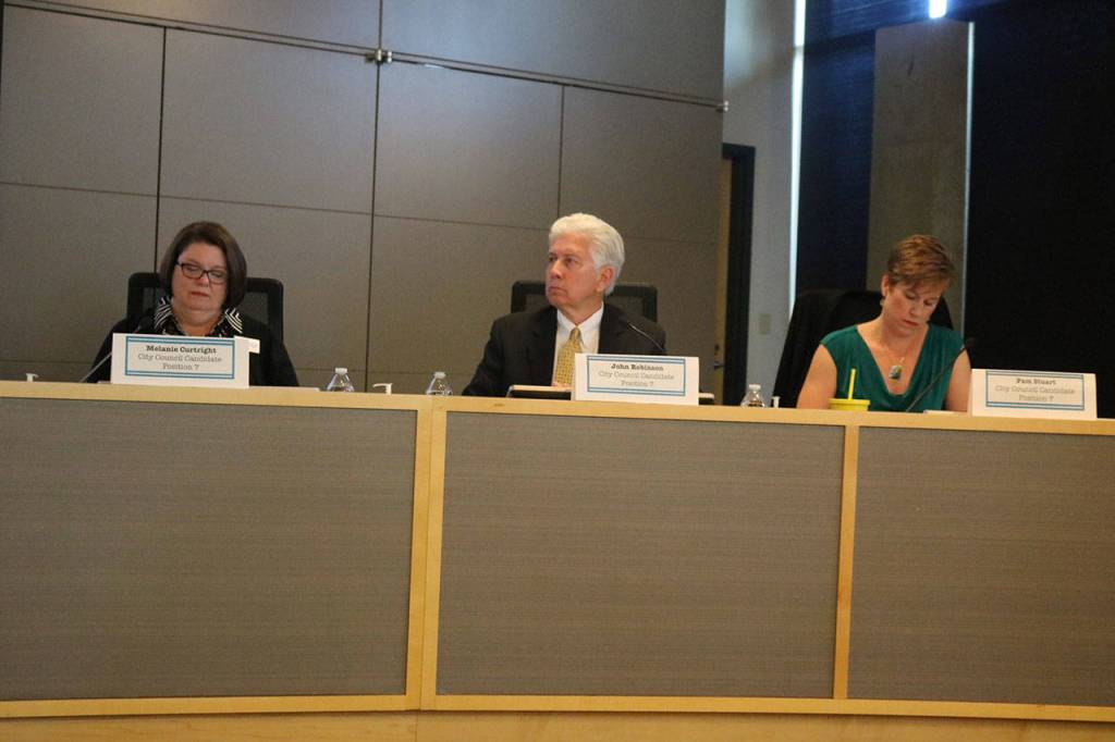 Position 7 candidates, from left to right, Melanie Curtright, John Robinson and Pam Stuart. Megan Campbell/staff photo