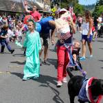 Lady Liberty waved to her fellow Americans as she strolled down Front Street with her equally patriotic pup. Nicole Jennings/staff photo