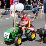 Fewer combinations say America quite as well as a John Deere tractor and the Star-Spangled Banner. Nicole Jennings/staff photo