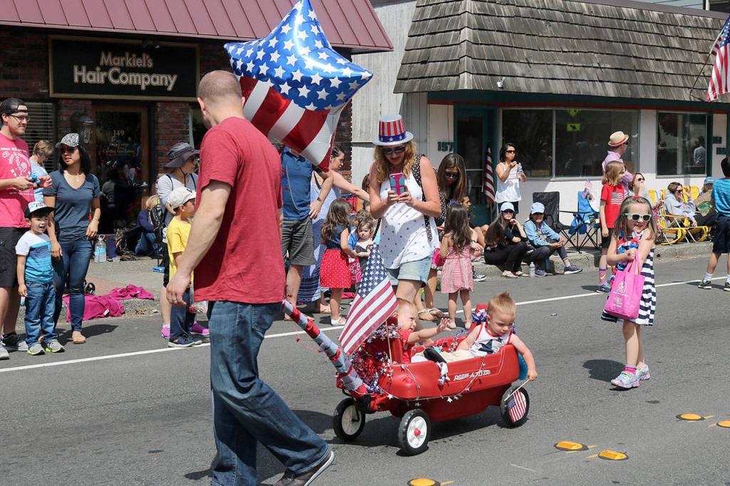 Entire families walked the parade route. Nicole Jennings/staff photo