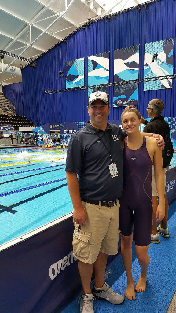 Photo courtesy of Carrie Tran                                Issaquah Sockeyes Swim team head coach Ryan Pachciarz, left, and athlete Sarah DiMeco, right, pose for a photo this summer. DiMeco recently competed in the 2017 Phillips 66 Nationals/World Championships in Indianapolis.