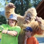 A mother and son get a selfie with the elusive Bigfoot. (Evan Pappas/Staff Photo)