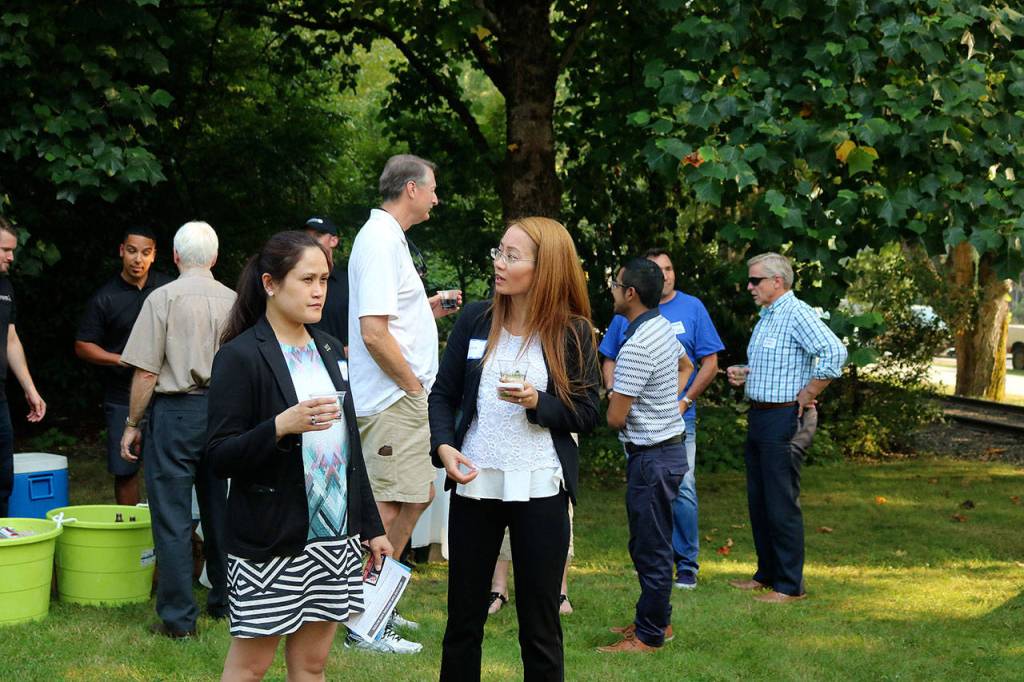 Issaquah Chamber members mingle, hula hoop and more at annual barbecue | Photos