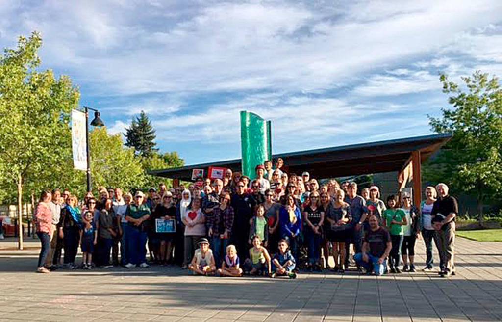 Sammamish residents gathered for a similar vigil Monday evening outside Sammamish City Hall. Photo courtesy of Plateaupians for Peace