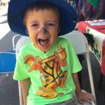 A boy enjoys the festivities during Eastside Baby Corner&rsquo;s annual Pants Party in 2016. Photo courtesy of Eastside Baby Corner