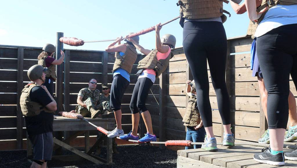 The recruits-in-training perform a simulation in which they have to rescue a wounded colleague. Nicole Jennings/staff photo