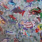 Robin Kelley, executive director of FISH, said that the mural is especially beautiful because the way the sunlight reflects off of the fish changes depending on the time of day. Nicole Jennings/staff photo