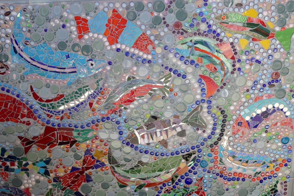 The mural depicts fish swimming in a stream, just like the salmon that come through Issaquah Creek and can be observed at the hatchery every autumn. Nicole Jennings/staff photo
