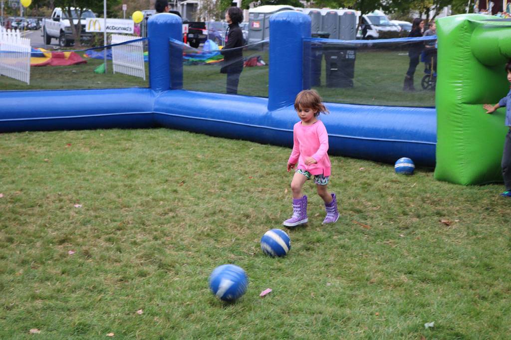 A soccer star-in-training tests her skills in the Field of Fun. Nicole Jennings/staff photo