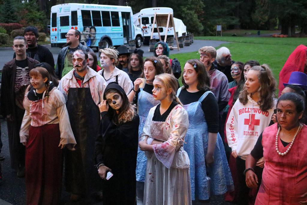 The cast of &ldquo;Nightmare at Beaver Lake,&rdquo; many of whom come back year after year, is a family, Cary Young stated. Nicole Jennings/staff photo