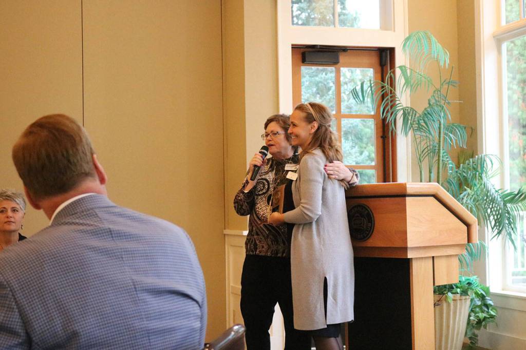 Chamber Director Deb Sogge, left, presents Family to Family Director Manuela Paul, right, with the award for Best Small Business. Nicole Jennings/staff photo