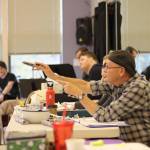 Director Steve Tomkins guides the Newsies at rehearsal two weeks before opening night. Photo courtesy of Village Theatre