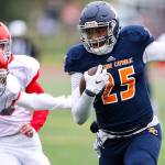 Photo courtesy of Rick Edelman/Rick Edelman Photography                                The Eastside Catholic Crusaders defeated the Stanwood Spartans 42-7 in a winner-to-state, loser-out football playoff game on Nov. 4 at Eastside Catholic School in Sammamish. Eastside Catholic (9-0) will face Edmonds-Woodway in the first round of the Class 3A state playoffs on Nov. 10 or Nov. 11. Eastside Catholic sophomore tight end DJ Rogers (pictured) makes a move up the field after hauling in a reception against Stanwood.