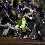 Photo courtesy of Don Borin/Stop Action Photography                                Issaquah Eagles players surround goalie Chloe Lang (yellow jersey) after she made two dramatic saves in a penalty kick shootout against the Puyallup Vikings. The Eagles outscored the Vikings 3-2 in the overtime shootout to capture a victory in the first round of the Class 4A state playoffs.