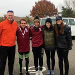 Photo courtesy of Troy Anderson                                The Eastlake Wolves girls and boys Cross Country teams were well represented at the Class 4A state meet on Nov. 4 at Sun Willows Golf Course in Pasco. Eastlake senior Nate Pendleton captured fourth place in the Class 4A boys division, clocking a time of 15:16.40. Eastlake senior Brooke Manson captured 20th place in the Class 4A girls division, tallying a time of 18:42.30. Eastlake boys head coach Troy Anderson, Pendleton, Manson, assistant coach Tracy Felton and Eastlake girls head coach Jody Anderson are pictured in the above photo.