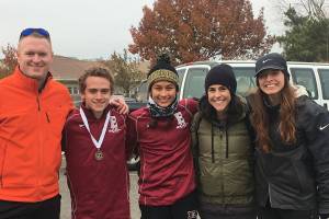 Photo courtesy of Troy Anderson                                The Eastlake Wolves girls and boys Cross Country teams were well represented at the Class 4A state meet on Nov. 4 at Sun Willows Golf Course in Pasco. Eastlake senior Nate Pendleton captured fourth place in the Class 4A boys division, clocking a time of 15:16.40. Eastlake senior Brooke Manson captured 20th place in the Class 4A girls division, tallying a time of 18:42.30. Eastlake boys head coach Troy Anderson, Pendleton, Manson, assistant coach Tracy Felton and Eastlake girls head coach Jody Anderson are pictured in the above photo.