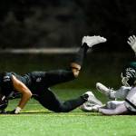 Photo courtesy of Rick Edelman/Rick Edelman Photography                                The Eastside Catholic Crusaders football team defeated Edmonds-Woodway 42-13 in the first round of the Class 3A state playoffs on Nov. 10 at Memorial Stadium in Seattle. Crusaders sophomore wide receiver Gee Scott Jr (pictured) hauls in a touchdown pass despite tight coverage from an Edmonds-Woodway defensive back in the contest. Eastside Catholic (10-0) will face the Garfield Bulldogs in the Class 3A quarterfinals on Nov. 17 or Nov. 18.