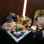 A typical big bundle given to a little boy, with enough clothes to last for a week. Nicole Jennings/staff photo