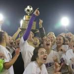Photo courtesy of Don Borin/Stop Action Photography                                The Issaquah Eagles girls soccer team hoists the championship trophy following their 2-1 victory against the Central Valley Bears in the Class 4A girls soccer state title game on Nov. 18 at Sparks Stadium in Puyallup.