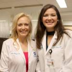 Doctors Jessica McHugh and Paige Kasai spent the morning showing people around the new clinic. (Evan Pappas/Staff Photo)
