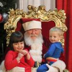 Maia and William Riley tell Santa what they want for Christmas. (Evan Pappas/Staff Photo)