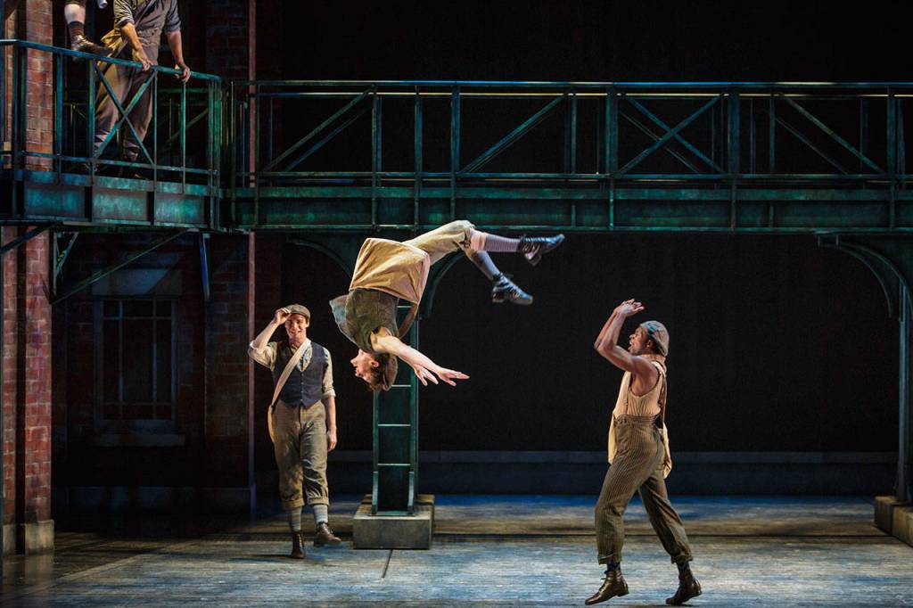 The show involves a host of gymnastics-esque dance moves from the cast, many of whom have gymnastics backgrounds. Photo courtesy of Village Theatre