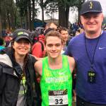 Photo courtesy of Troy Anderson                                Eastlake Wolves senior Cross Country runner Nate Pendleton, center, rose to the occasion in the final race of his high school career. Pendleton captured 49th place, clocking a time of 15:55.1 at 2017 Nike Cross Nationals on Dec. 2 in Portland, Oregon.